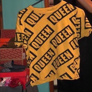 Yellow crop top that says queen on it